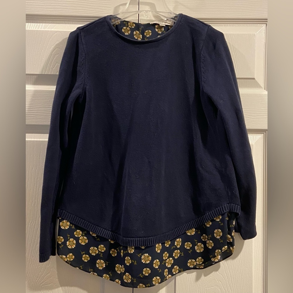 The Loft size small sweater. Navy with floral undershirt.